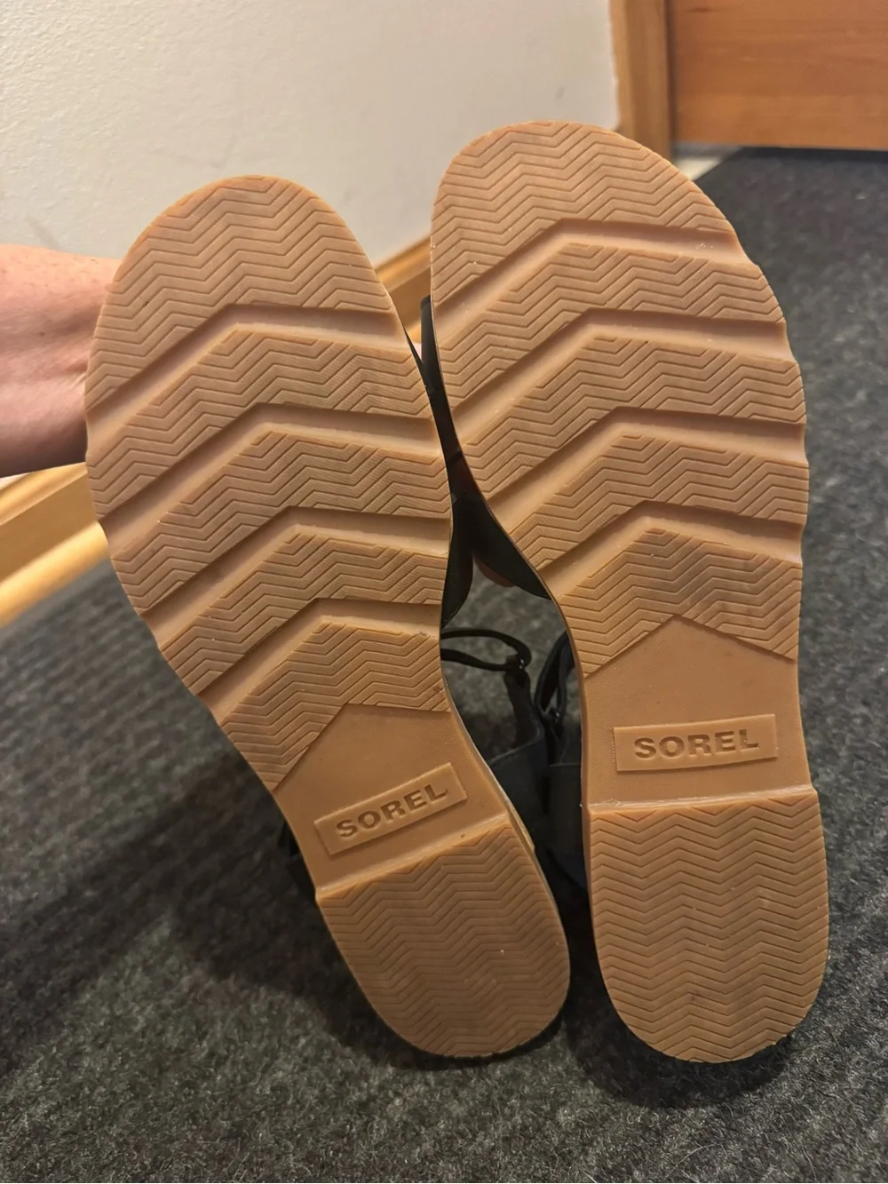Sorel Black Slide Sandals with Tan Trim